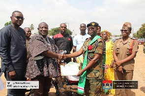 Brig. Gen. Albert Dawohoso receiving his award