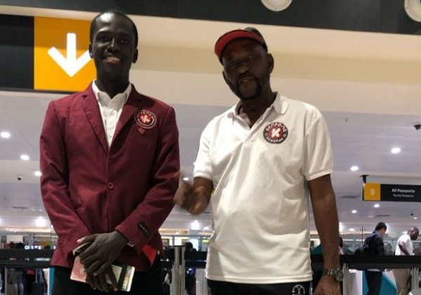 Richard Okyere and coach JE Sarpong at Kotoka International Airport