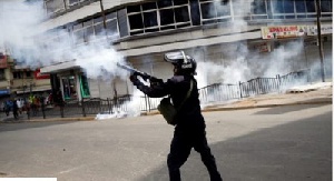 Kenya police firing teargas to clear protest