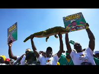 Supporters of Zimbabwean President Emmerson Mnangagwa attend a campaign rally in Harare