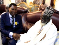 Yaw Annor,CEO of NHIA in a handshake with the National Chief Imam, Sheikh Nuhu Sharubutu