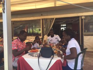 Afriyie Acquah having a meal with Agent's family