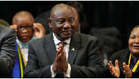 President Cyril Ramaphosa reacts after being re-elected during the first sitting
