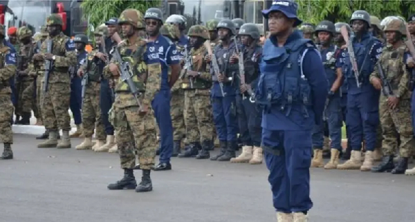 File photo of Police and military officers about to perform a task