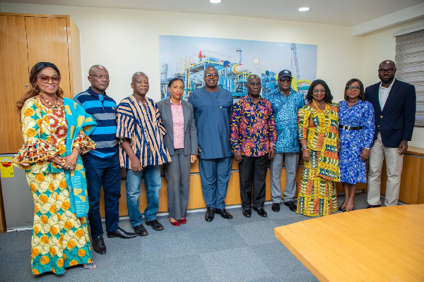 Board of GNGC in a group photo with the CEO of GCMC,  Genevieve Sackey