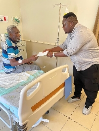 The company presented a donation of GH¢5,000 along with essential items to the ailing musician