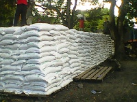 COCOFEED fertiliser being distributed to farmers