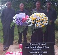 Asamoah Gyan at his mother's grave