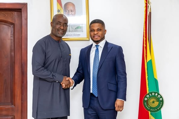 GoldBod CEO, Sammy Gyamfi (R) in a handshake with the President of GNCCI