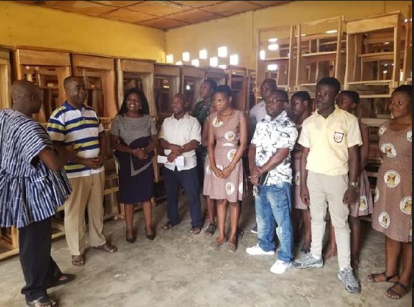 Mr. Kwabena Bempong, (in lacoste) Birim Central MCE presenting the mono-desks