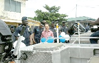 Japanese Ambassador to Ghana, Mr. Tsutomu Himeno and senior officers of the GPS inspecting the boats