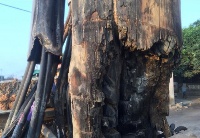 The electric pole was burnt by fire for almost two months