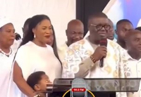 Rockson-Nelson Dafeamekpor with his wife Ebi Bright and one of their children at church