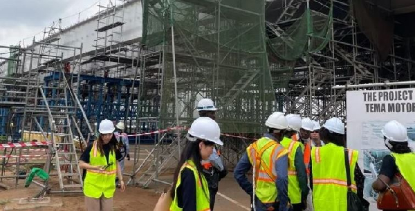 Officials from the Japanese Embassy and JICA touring project site