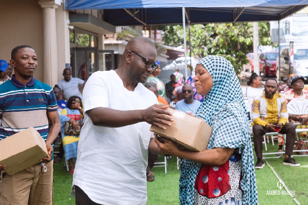 Asenso-Boakye with one of the widows