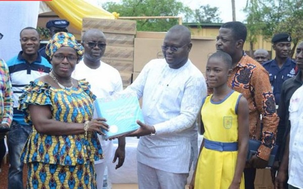 Francis Asenso-Boakye making the presentation with Osei Assibey Antwi, Daniel Okyem Aboagye