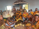 Chief of Ejura Traditional Council, Barimah Osei Hwedie II (L) under the umbrella