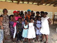 Mrs. Asomaning-Antwi with some of the children in the institution