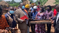 State Minister for Minerals Sarah Opendi (third right) interacts with local leaders from Bugiri