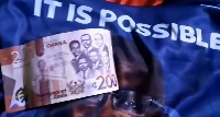 A GH¢200 note and a Bawumia branded t-shirt allegedly bing shared