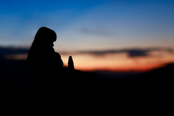 A file photo of a worried woman