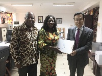 H.E. Shi Ting Wang is welcomed to the Ministry by Catherine Afeku and her deputy Dr Ziblim Iddi
