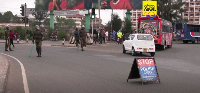 Kenyan police officers arrested protesters near parliament during a demonstration