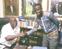 President Nana Addo Dankwa Akufo-Addo in a handshake with Awal Mohammed