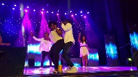 Lydia Forson on stage with Okyeame Kwame