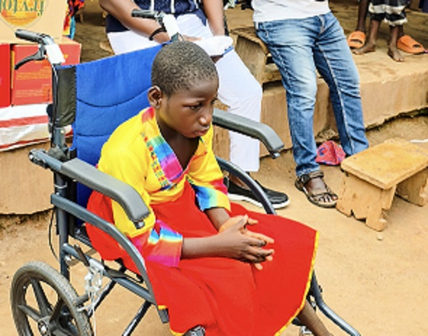 The disabled pupil siting on the wheelchair