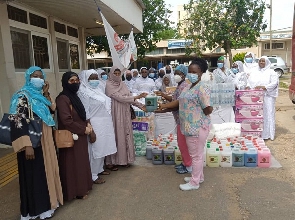 President Hajia Anisa Nasirdeen Iddrissu presenting the items