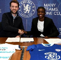 Ato Ampah with a Chelsea official
