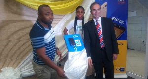 Maxwell Techie (left), CEO, TECNO Mobile and Asher Khan (right), CMO, MTN unveiling Camon CX