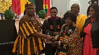 A member of the association receiving her award