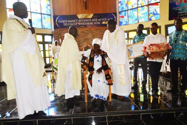 Mrs. Cecilia Adwoa Amankwah being installed by the Priests as Best Mother of the Year.