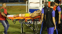 Ramon Souza on a stretcher after being shot