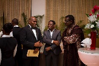 CEO of Capital Bank (left), Fitzgerald Odonkor, in an interaction with the Board Chairman