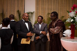 CEO of Capital Bank (left), Fitzgerald Odonkor, in an interaction with the Board Chairman
