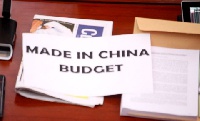 One of the placards displayed by the Minority in Parliament during the reading of the 2019 budget
