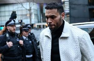 Chris Brown is pictured outside a courthouse in London