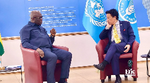 Eric Opoku (L) with an EU official at the conference