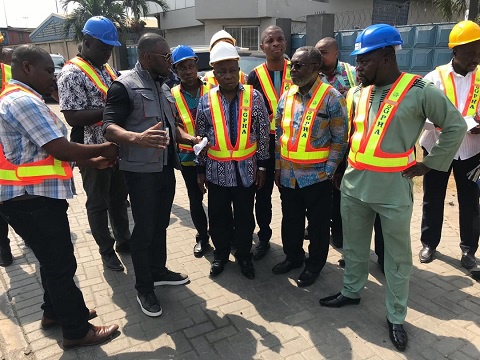 Health Minister being surrounded by some staff of Tema Port and LCB World Wide Ghana