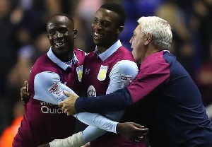 Albert Adomah (L) celebrating with the Villa team
