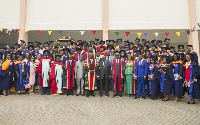 President Akufo-Addo in a group photograph with some graduate doctors