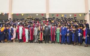 President Akufo-Addo in a group photograph with some graduate doctors