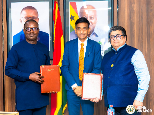 John Jinapor (L) with the ISA leadership at the signing ceremony