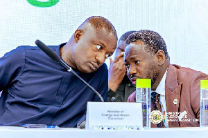 Minister of Energy, Dr John Abdulai Jinapor (L) and MD of BOSTenergies, Afetsi Awoonor (R)