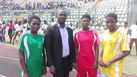 Emmanuel Olla Williams with some athletes at a recent sports event