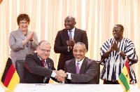 Vice president Bawumia, Dr. Fritz Sacher of Merck and Andrew Clocanas of RMS, after signing the MoU