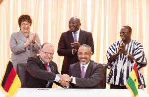 Vice president Bawumia, Dr. Fritz Sacher of Merck and Andrew Clocanas of RMS, after signing the MoU